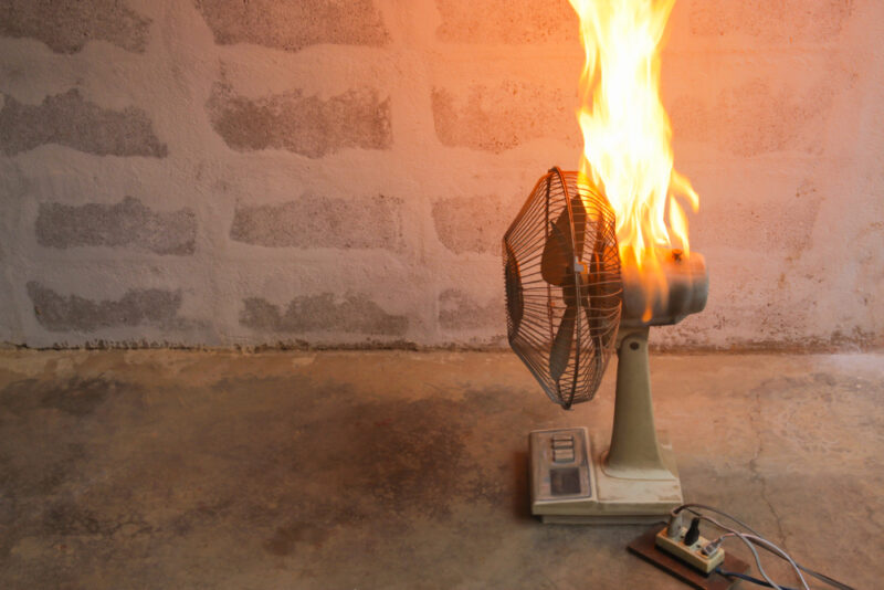 A fan is shown with flames shooting out of the top.